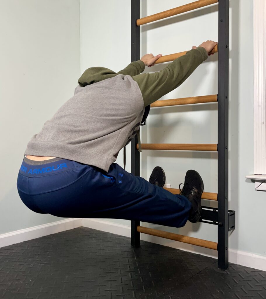 stretching on benchk wall bars