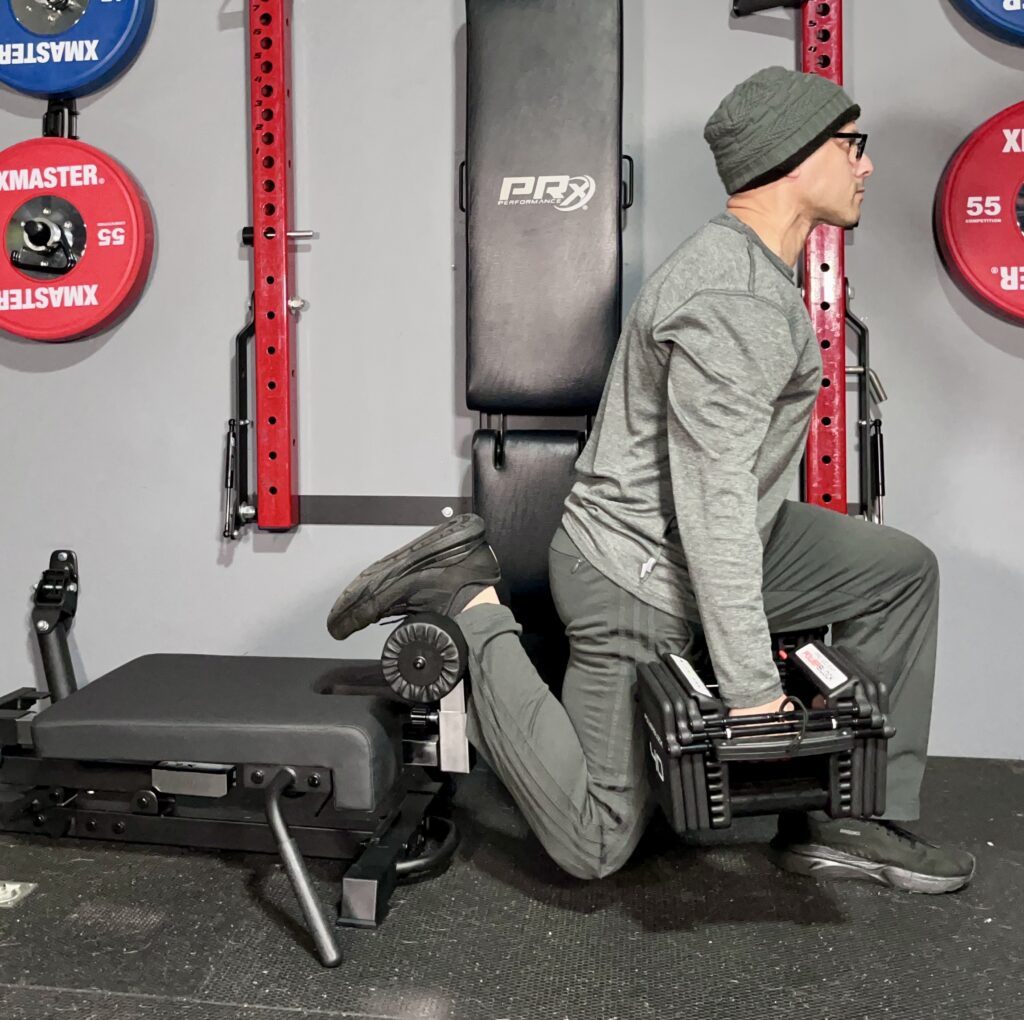 split squats on the tib bar guy nordic back extension v2