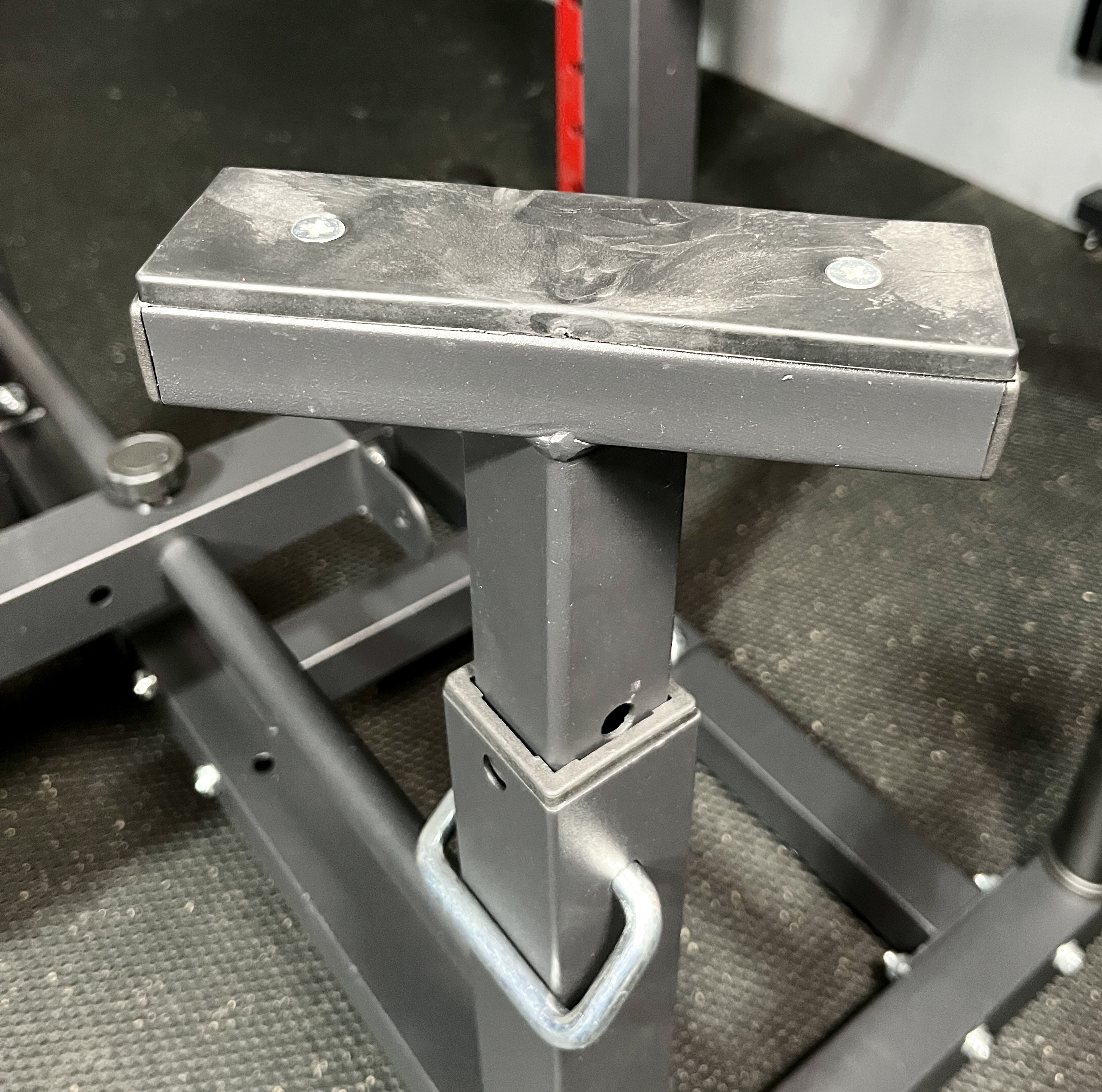 spotter arms on the plate loaded chest press machine