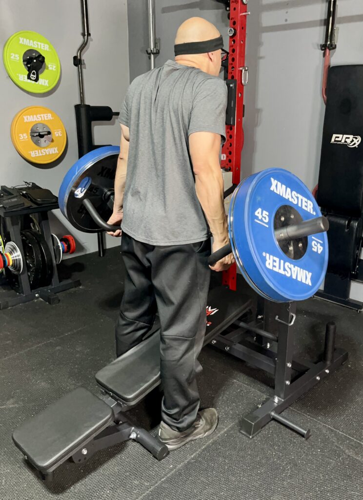 shoulder shrugs on the chest press machine