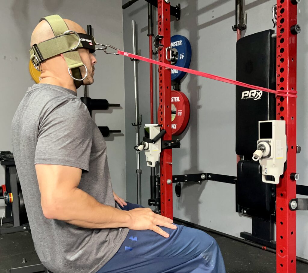 using the iron neck harness with a resistance band