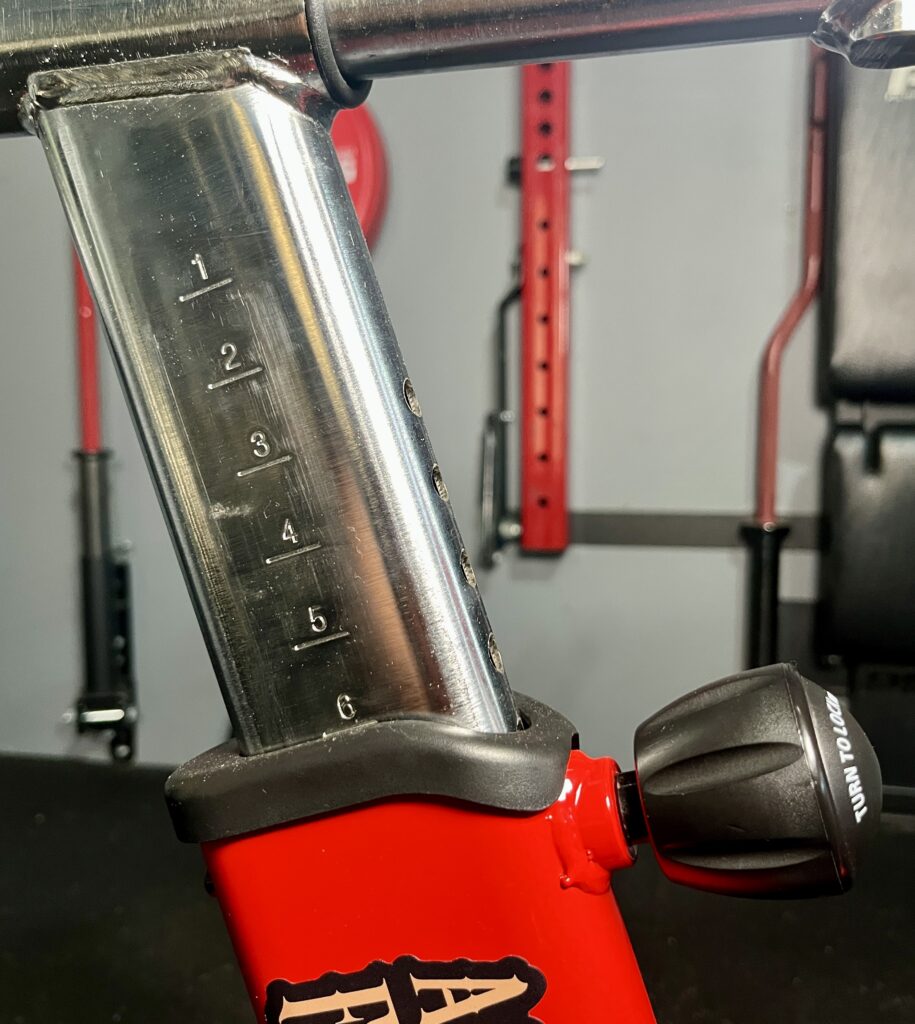 adjusting the seat height on the assault bike