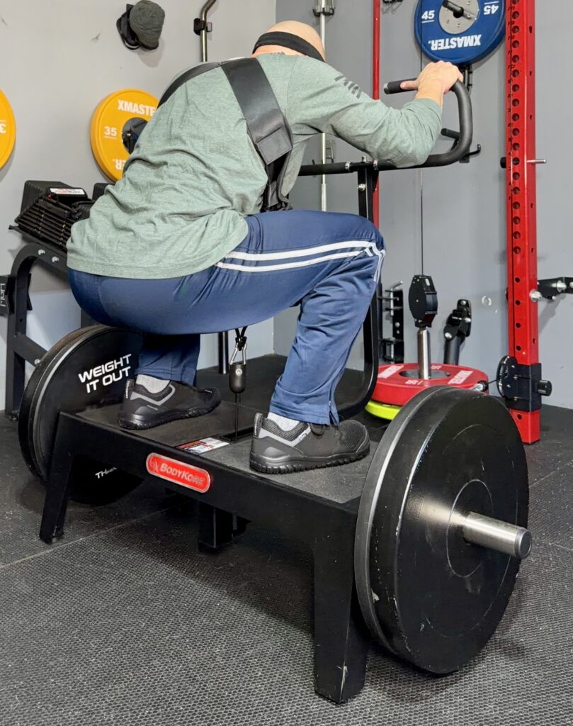 using the squat harness with the bodykore squat box pro belt squat platform
